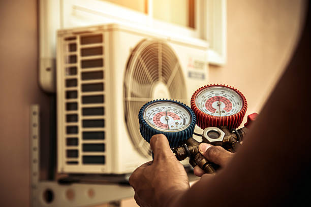 Professional Air Conditioning Service technician working in Cadiz, KY
